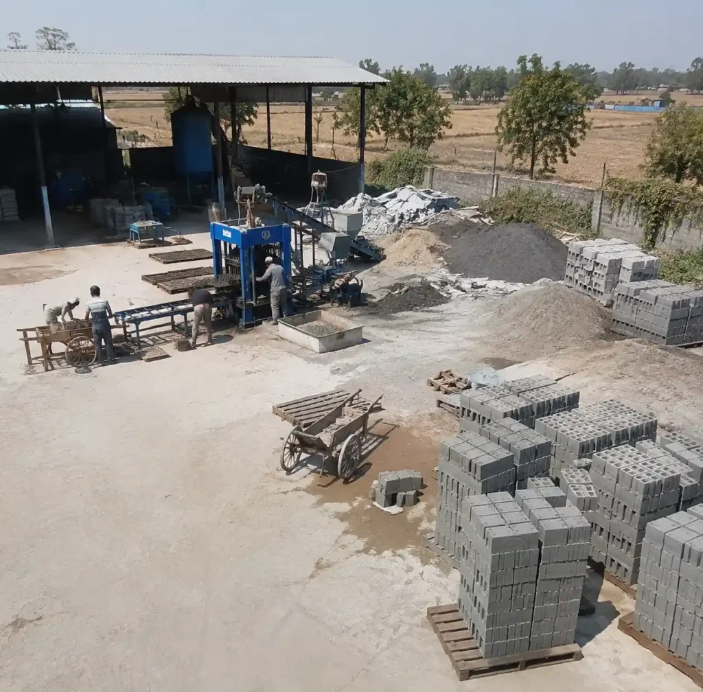 Small-scale manual block making factory showing compact production setup on limited land area