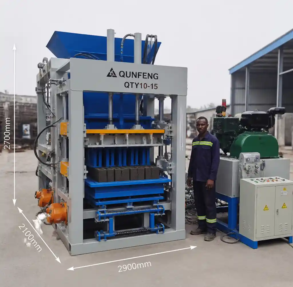 Hydraulic egg layer block machine showing compression and vibration system