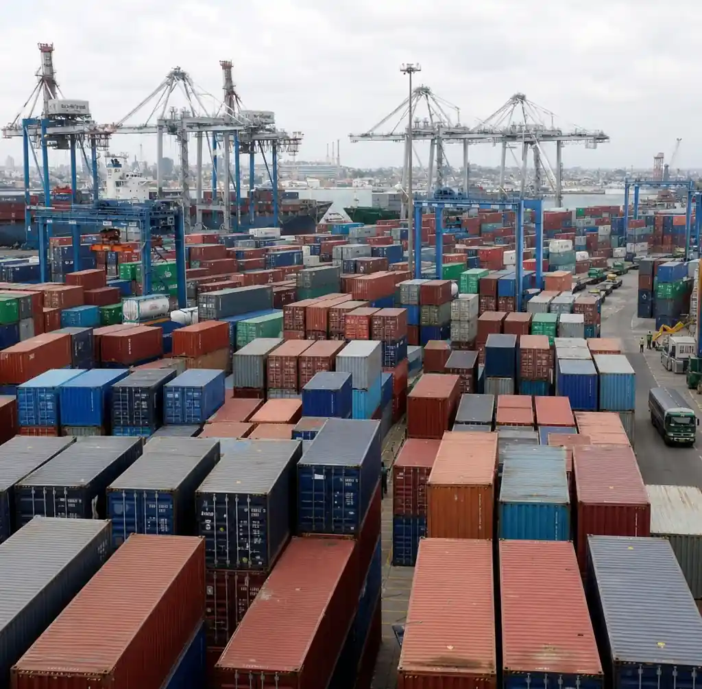Container terminal at Lagos port showing shipping containers and machinery handling equipment