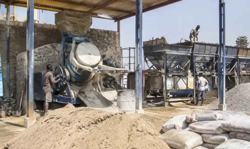 Concrete mixer and batching system for block production in Africa