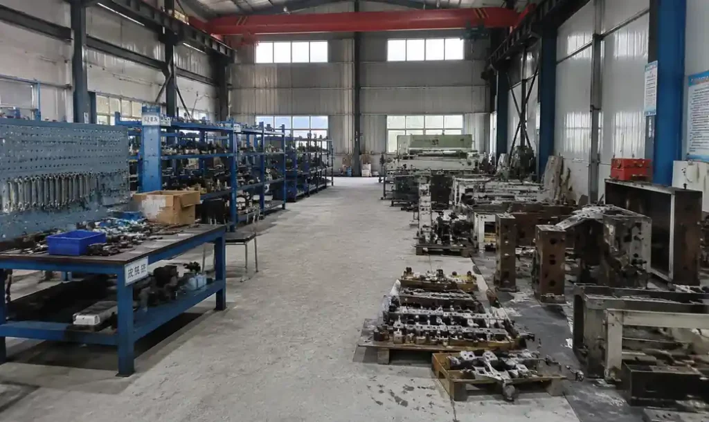 Block factory maintenance workshop with tools and spare parts storage